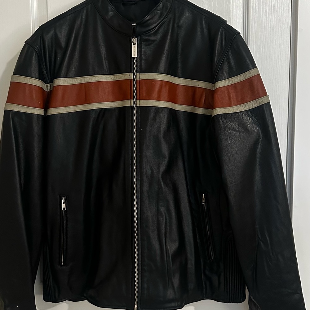 Wilsons Leather Black Jacket with Orange accents.